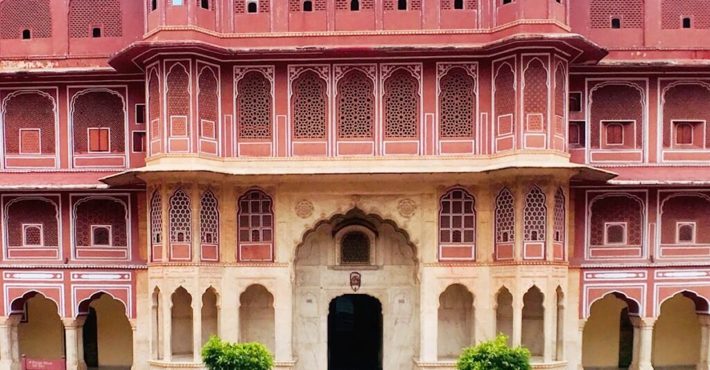 Explore the vibrant traditional architecture of Jaipur's historic Jantar Mantar with this captivating facade image.